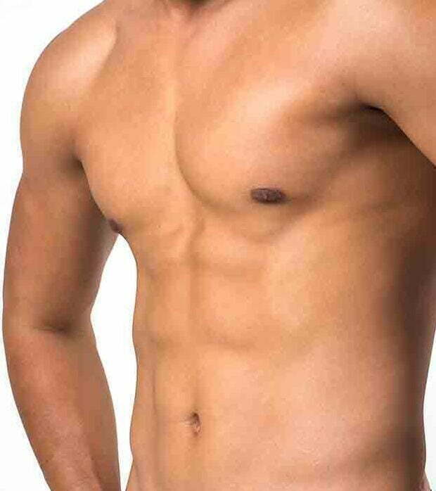 Muscular man showing six pack abs isolated on white background.